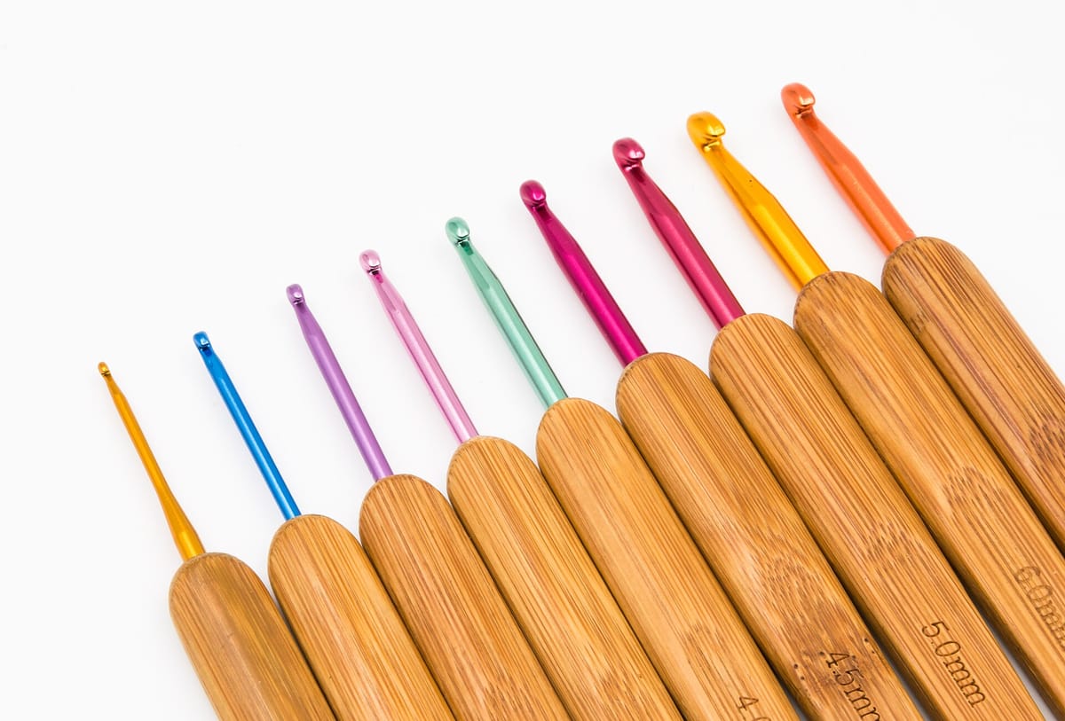 Set of bamboo-handled crochet hooks in a range of sizes, for the crochet hook size chart